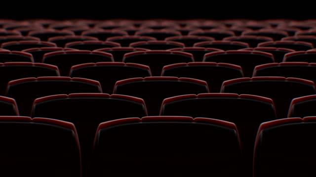 Moving+Behind+the+Chairs+in+Abstract+Cinema+Hall+with+Black+Screen+Seamless.+Looped+3d+Animation+of+Rows+of+Seats+in+Cinema.+Art+and+Media+Concept.+4k+Ultra+HD+3840x2160.